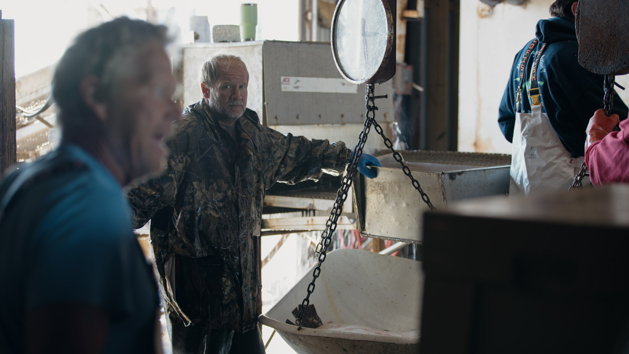 A crew unloads and ices fish at a Wanchese fish house.
