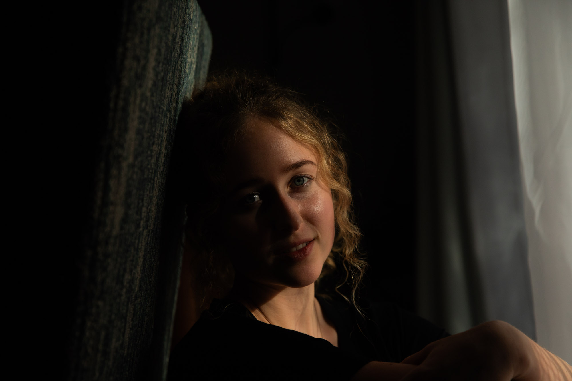 Lucia Smith by chair